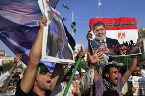 Supporters of ousted President Mohammed Morsi chant slogans during a rally. (Source: AP Hassan-Ammar) jpg